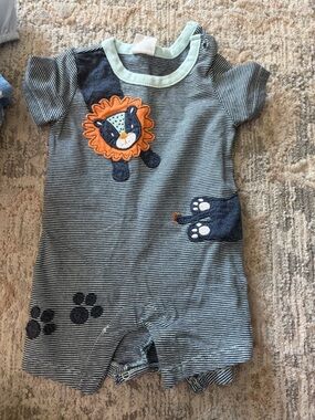 Starting Out Navy & White Striped One-Piece with Orange Lion Applique